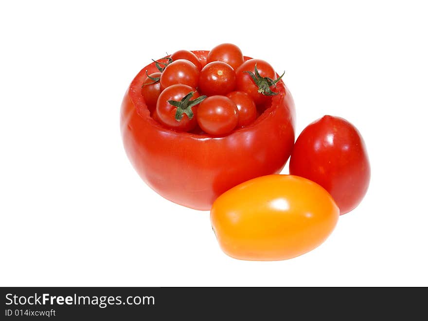 Small and big tomatoes isolated on white background