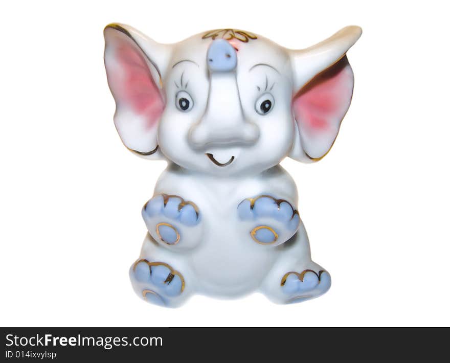 Porcelain figurine of an elephant on a white background. Porcelain figurine of an elephant on a white background