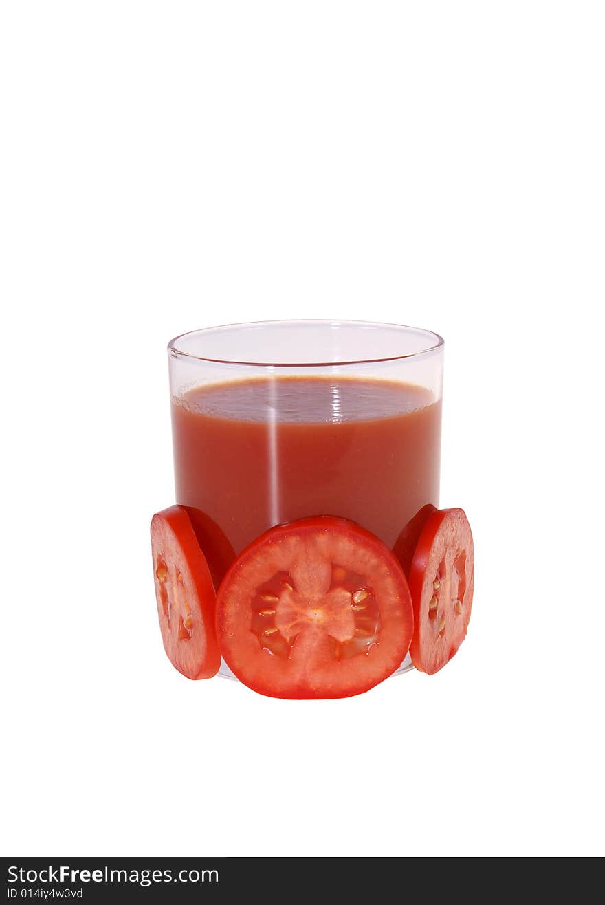 Glass full of tomato's juice and slices isolated on white background