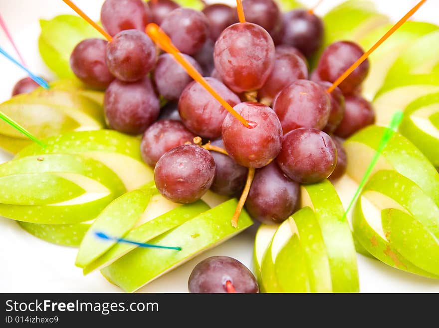 Green apples and red vine