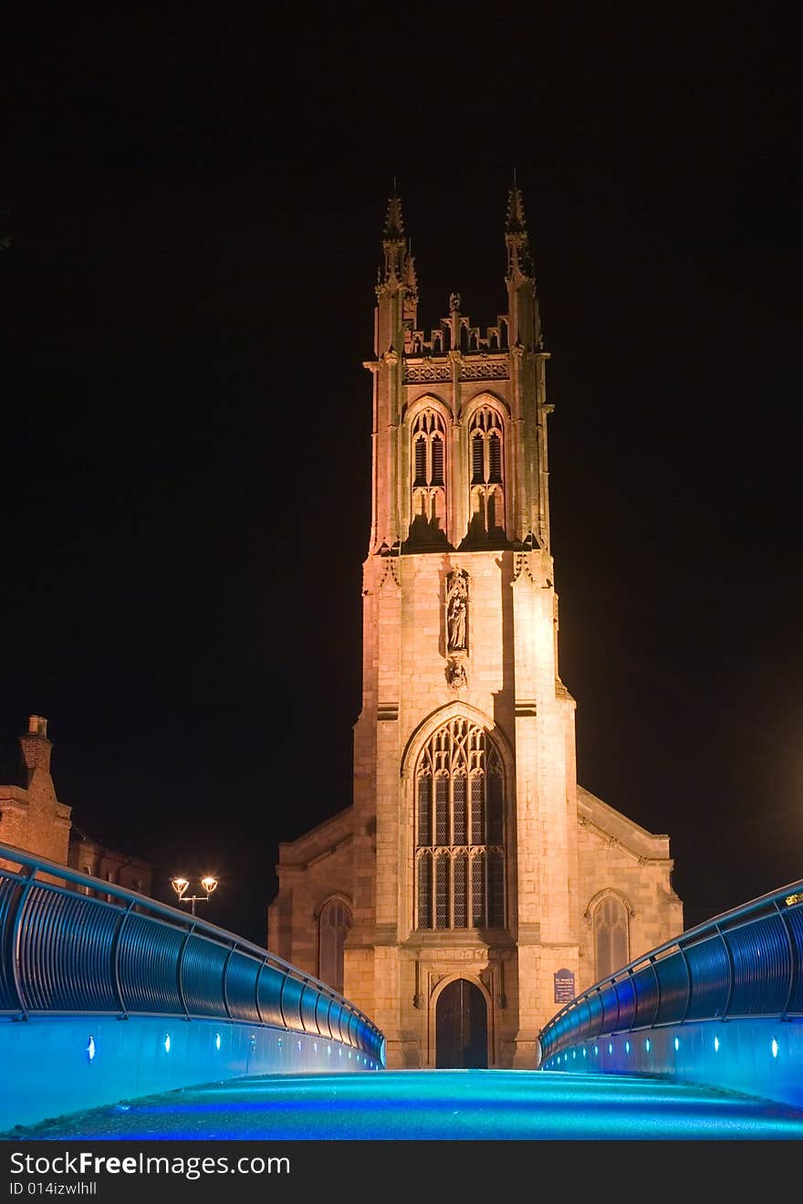 St. Mary's church photographed by night. The lightning color of bridge changed. St. Mary's church photographed by night. The lightning color of bridge changed.