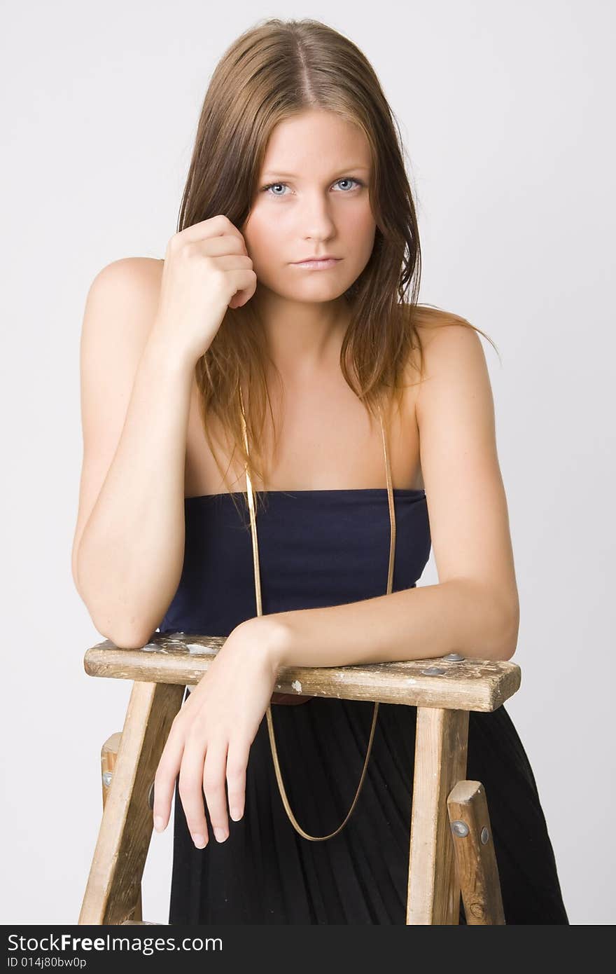 Portrait of young beautiful woman on white background