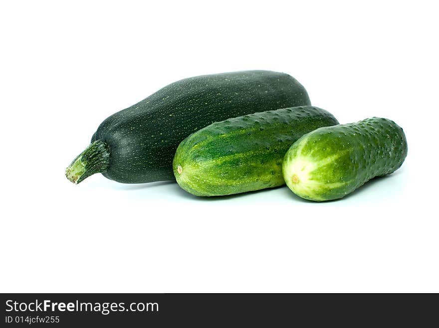 Cukini And Pair Of Cucumbers