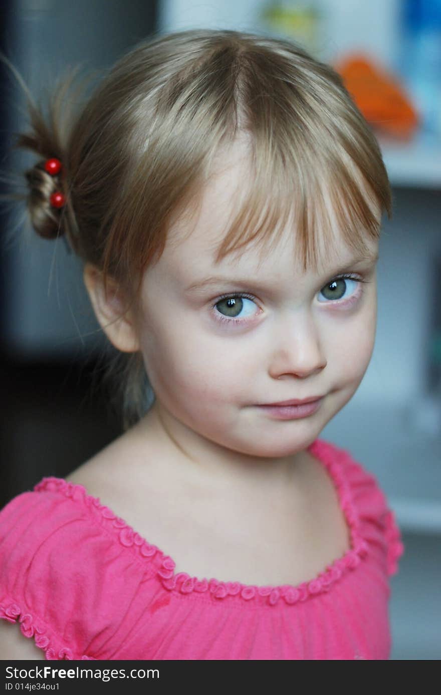 The green-eyed girl in a pink dress. The green-eyed girl in a pink dress