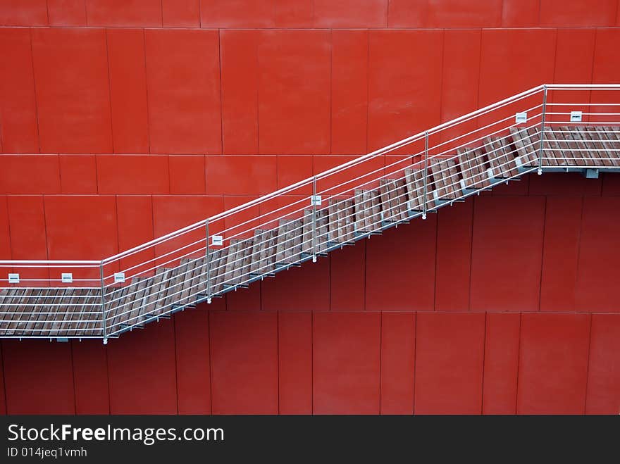 Stair and a red wall
