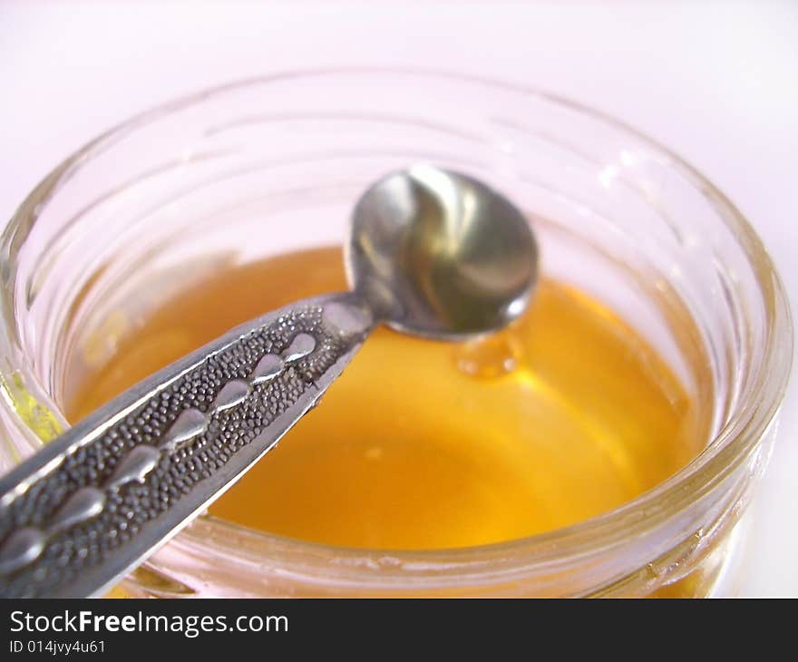 Honey In Jar And Spoon