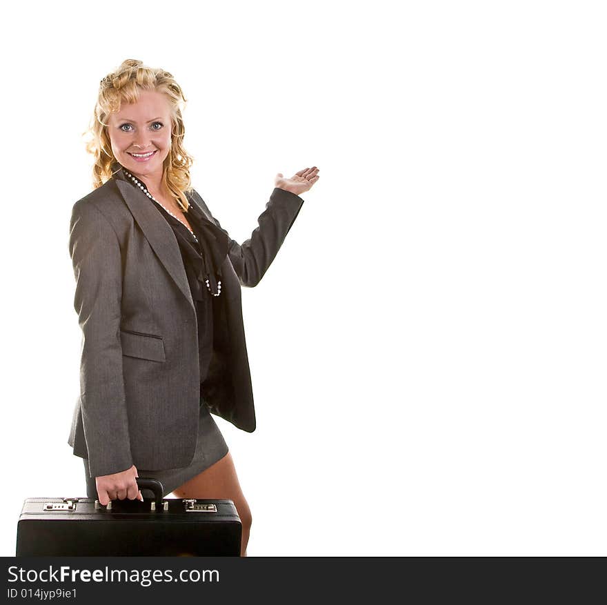 A businesswoman with curly blonde hair in a business suit carrying a briefcase and holding her hand up as if displaying or showing something. A businesswoman with curly blonde hair in a business suit carrying a briefcase and holding her hand up as if displaying or showing something