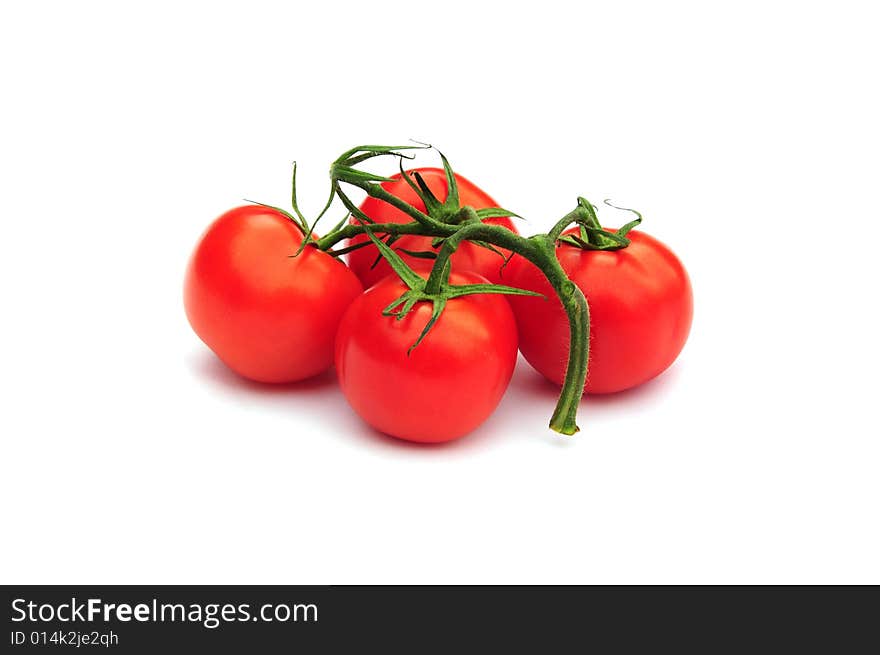 Shot of some tomatoes isolated on white