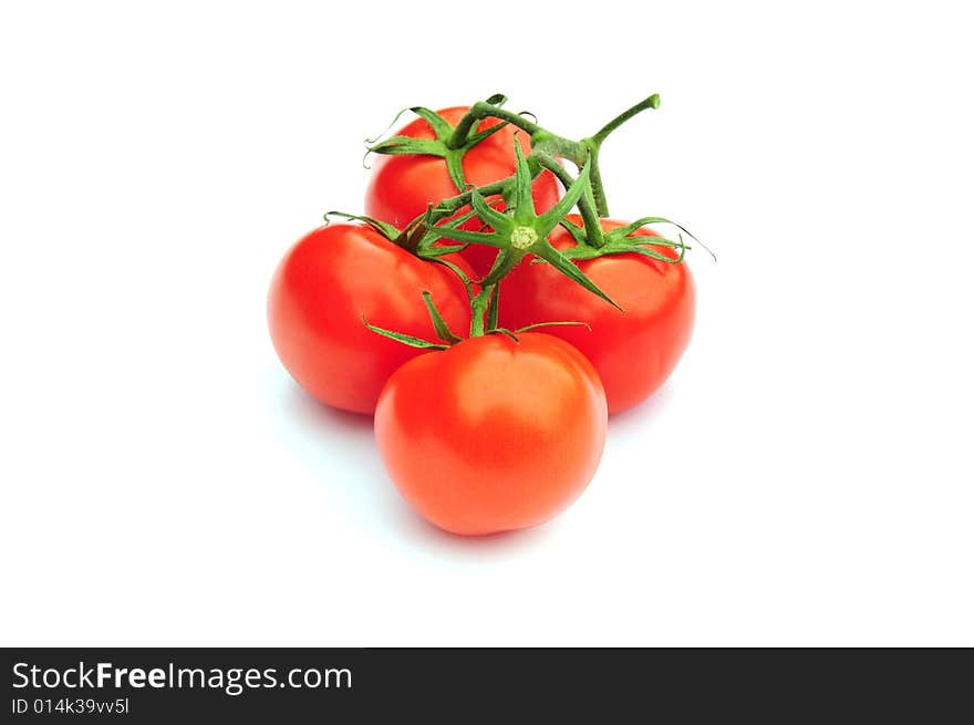 Shot of some tomatoes isolated on white