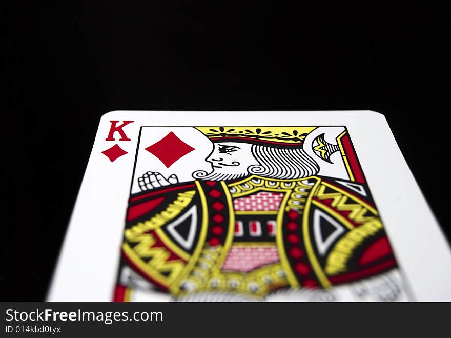 King of Diamonds against black background. King of Diamonds against black background