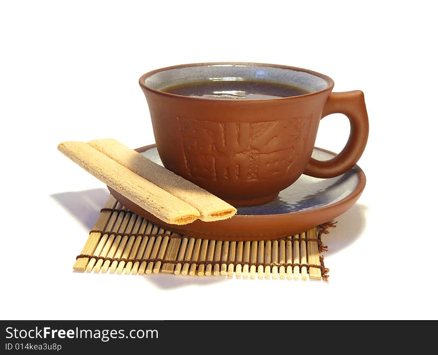 Ceramic Cup Of Tea And Cookies On White