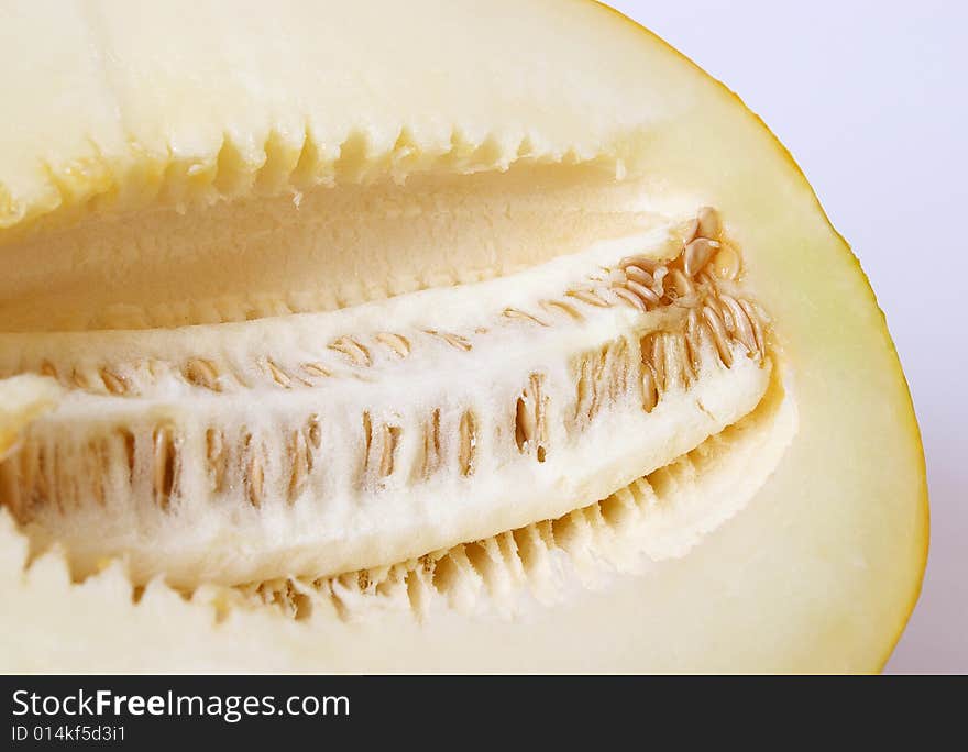 Half of ripe juicy melon. A closeup. Half of ripe juicy melon. A closeup