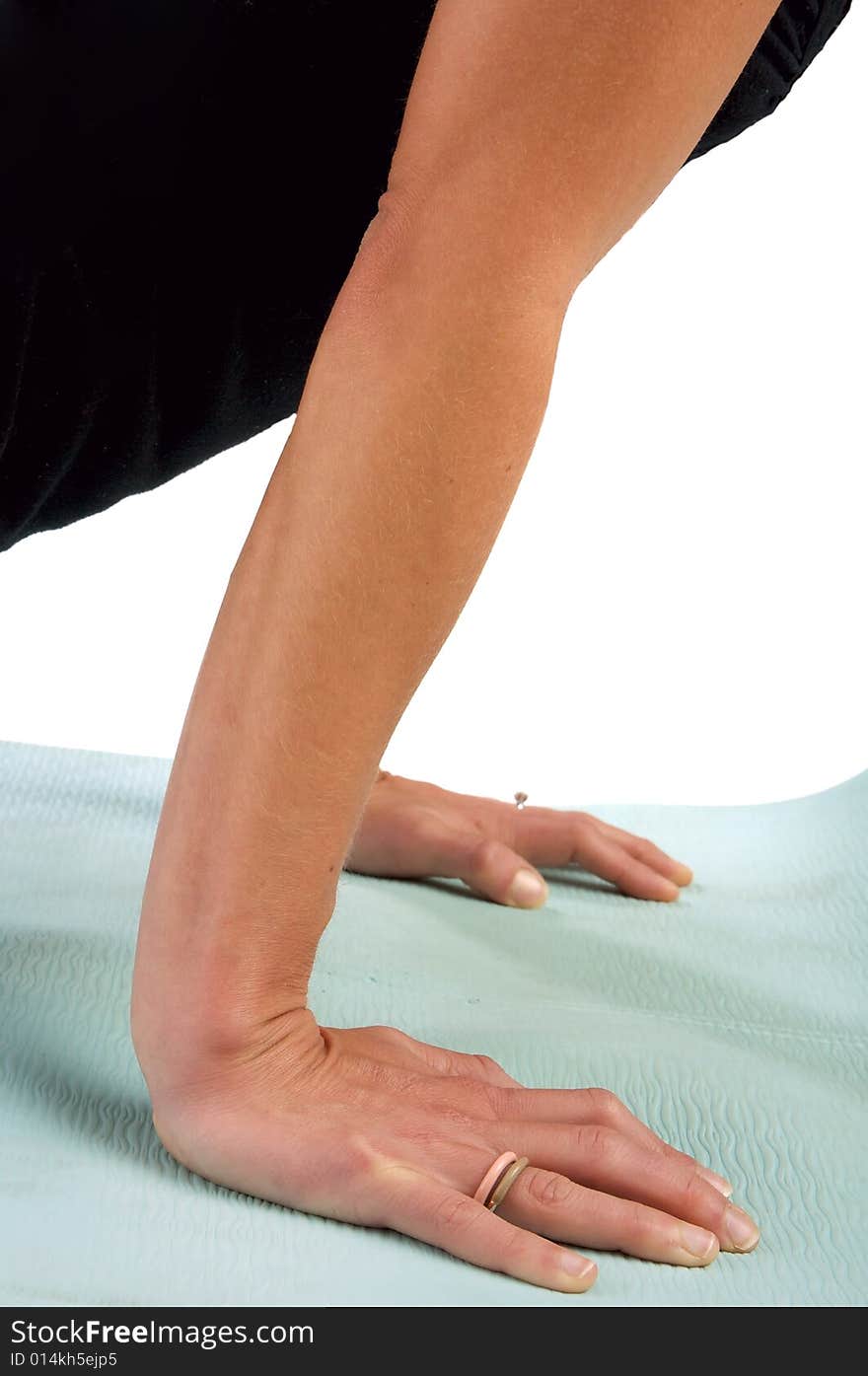 Young woman doing yoga exercises