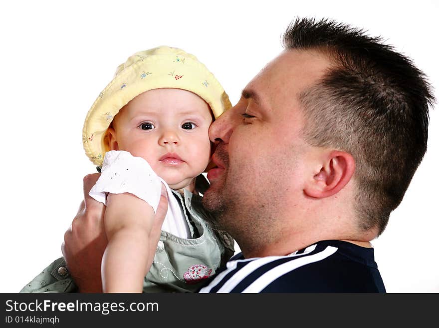 A happy father playing with a baby