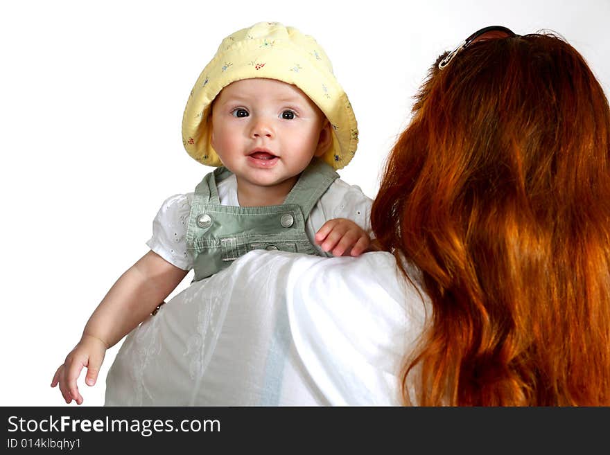 A woman with a baby in her hands. A woman with a baby in her hands