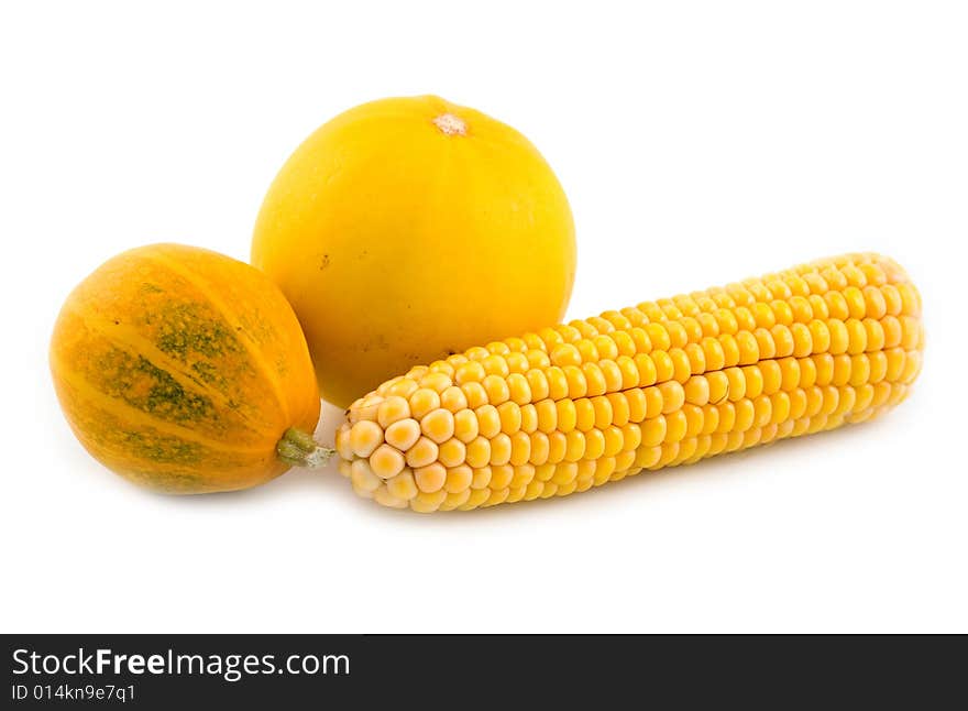 Corn with a yellow pumpkin