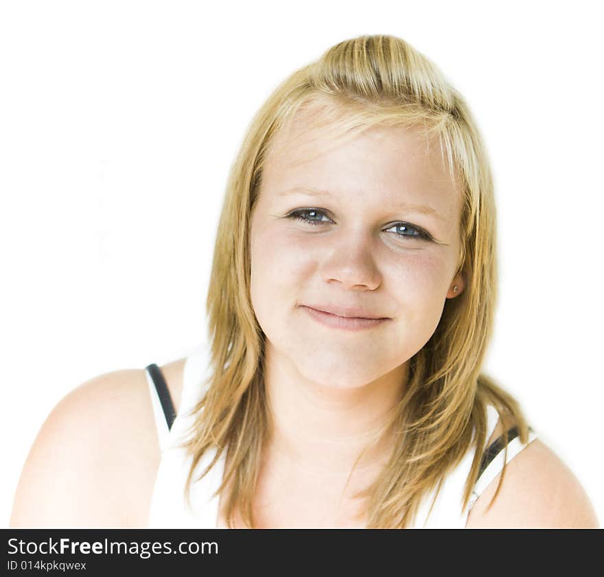 Young teenage girl looking happily into camera. Isolated on white background. Young teenage girl looking happily into camera. Isolated on white background