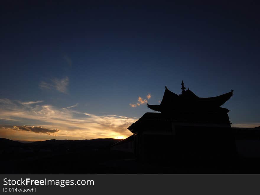 Sunset, the temple stands a quiet, beautiful. Sunset, the temple stands a quiet, beautiful