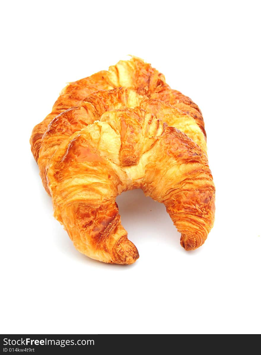 Some tasty croissants on a white background