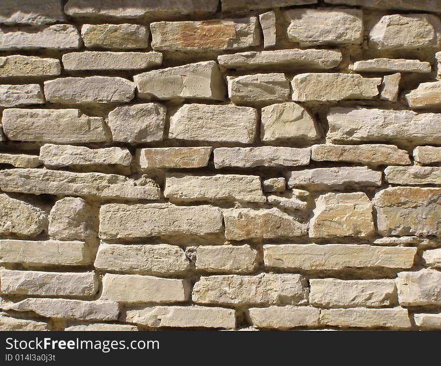 An old shabby brick wall. An old shabby brick wall