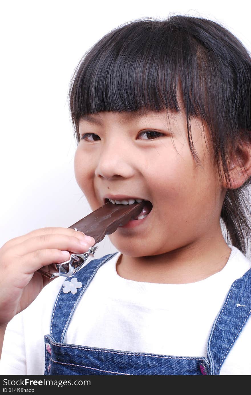 Asia girl eating chocolate