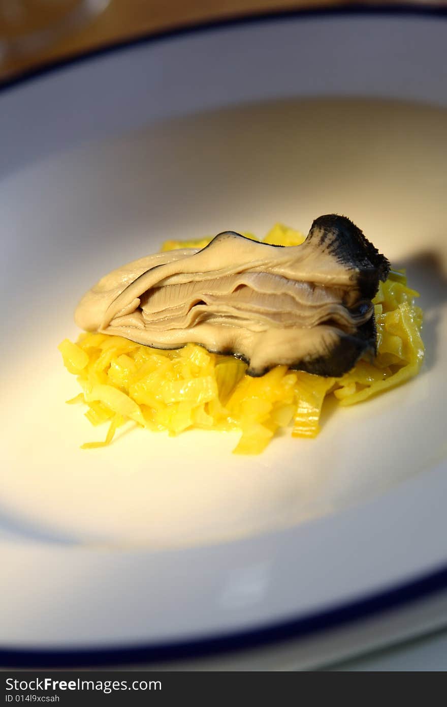 Cooked mussel isolated on a plate