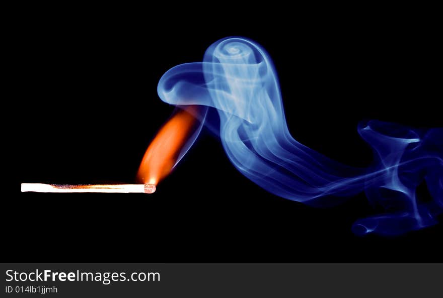 Match fire smoke on black background