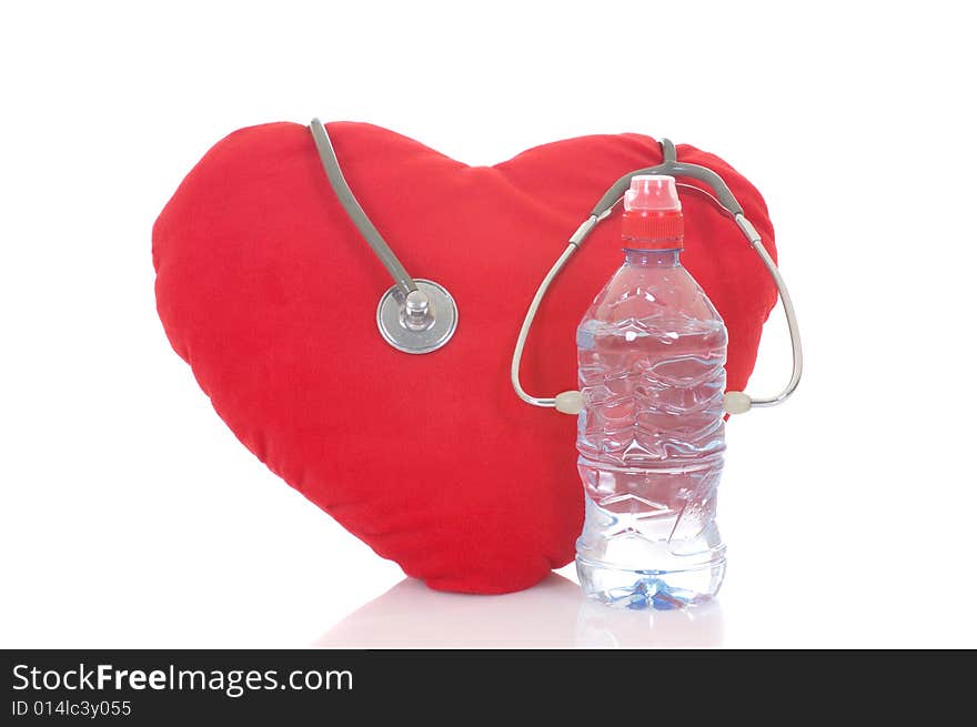 Heart with bottle and stethoscope isolated on white background. Heart with bottle and stethoscope isolated on white background