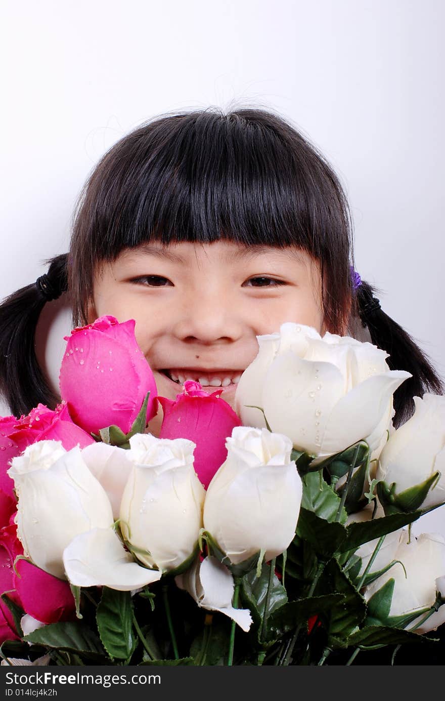 Asia girl holding colorful flowers. Asia girl holding colorful flowers