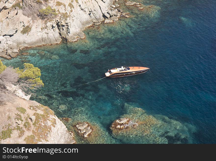 Top view of a ship anchored on clear sea. Top view of a ship anchored on clear sea