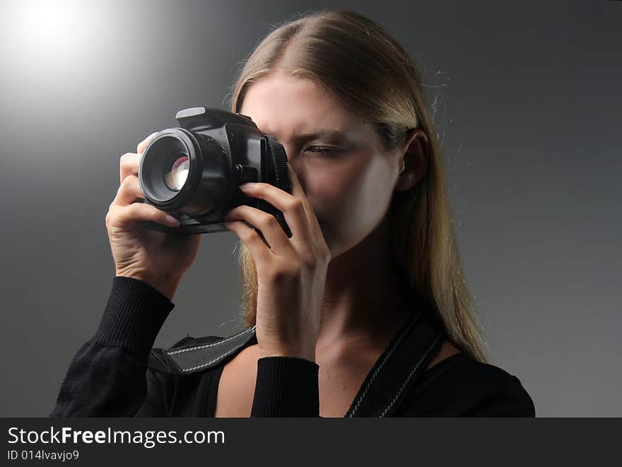 A girl with photo camera