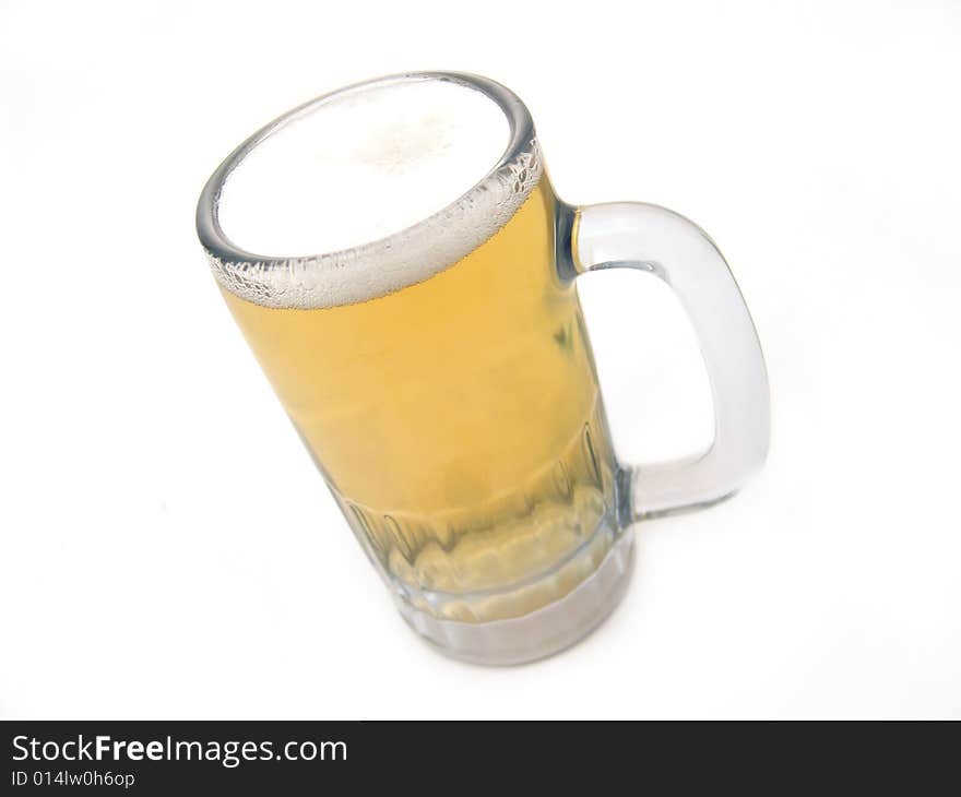 Close up of glass mug with beer. Close up of glass mug with beer