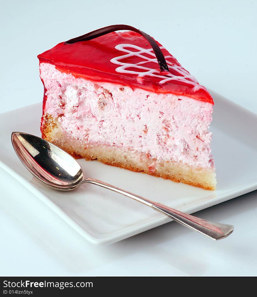 Cheese cake with strawberry topping. Cheese cake with strawberry topping