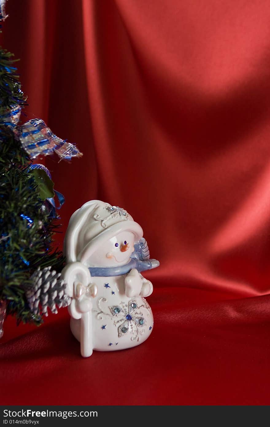 Snowman  with christmas tree