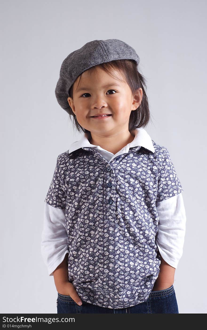 Little asian girl with a hat