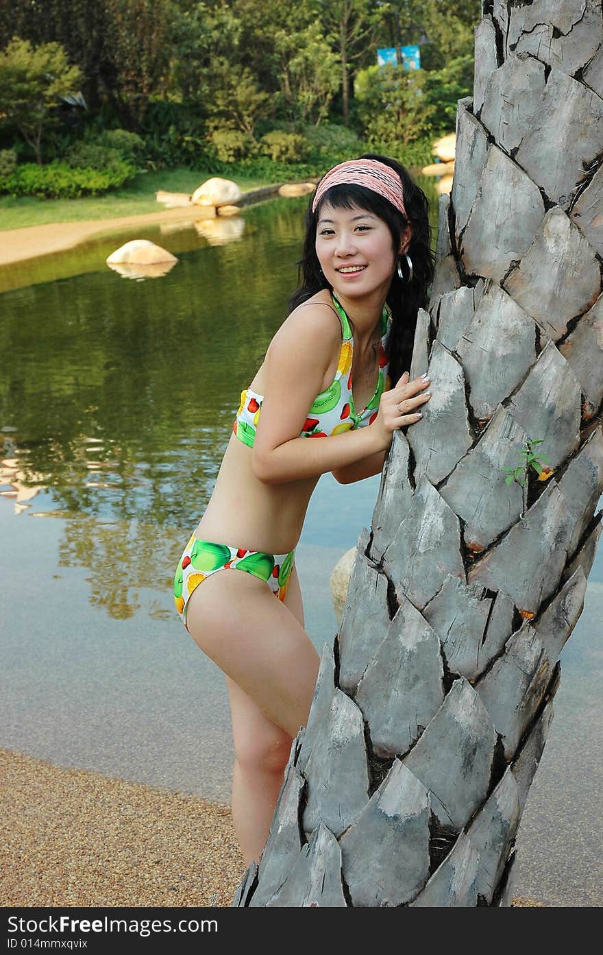 The bathing beauty in a park . The bathing beauty in a park .