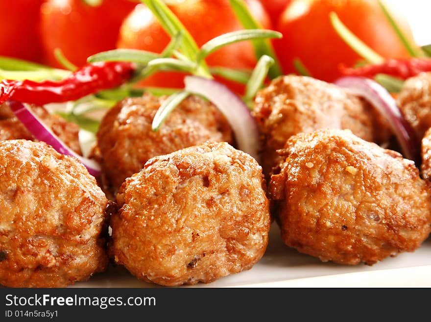 Fried pork with herbs and tomatoes. Fried pork with herbs and tomatoes