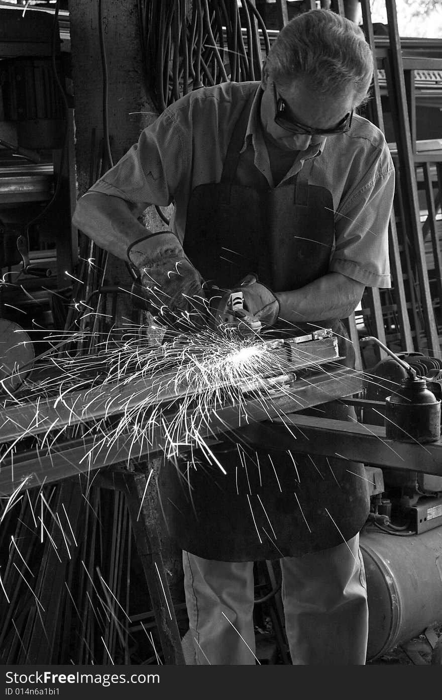 A blacksmith in the workshop