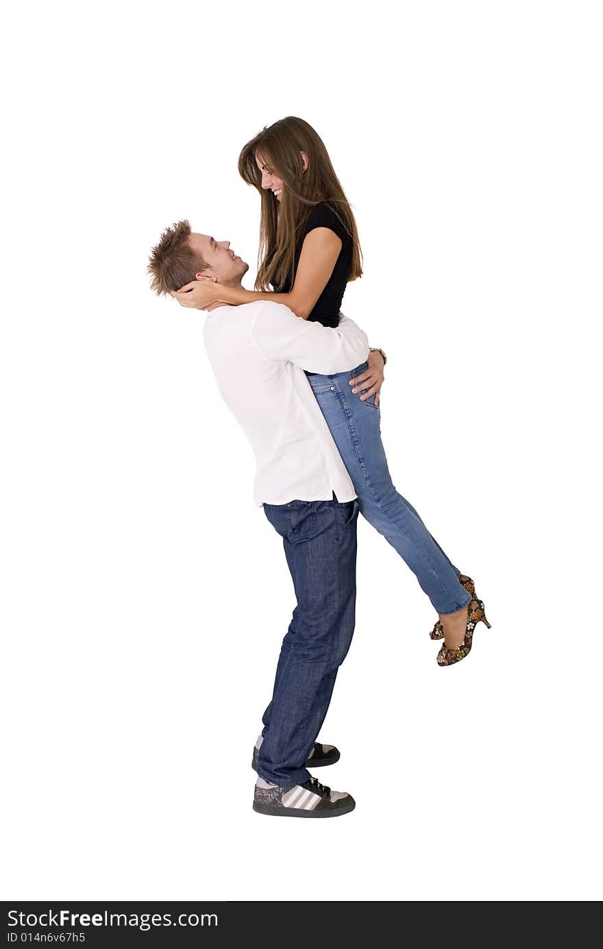 Boy is holding his girlfriend in the air. Boy is holding his girlfriend in the air