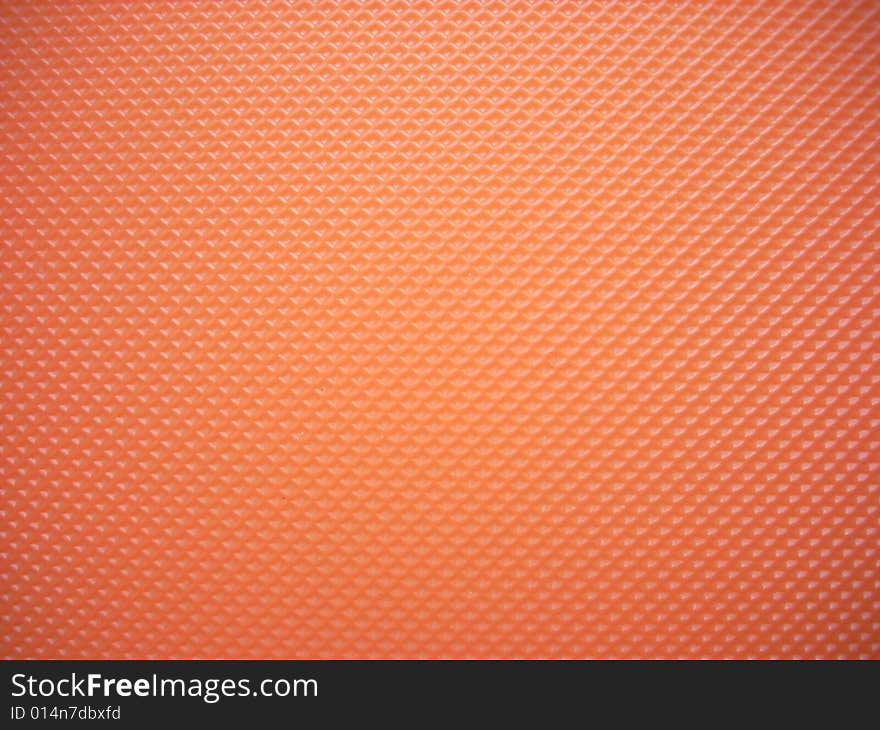 A photograph of orange material. Fine texture. A photograph of orange material. Fine texture