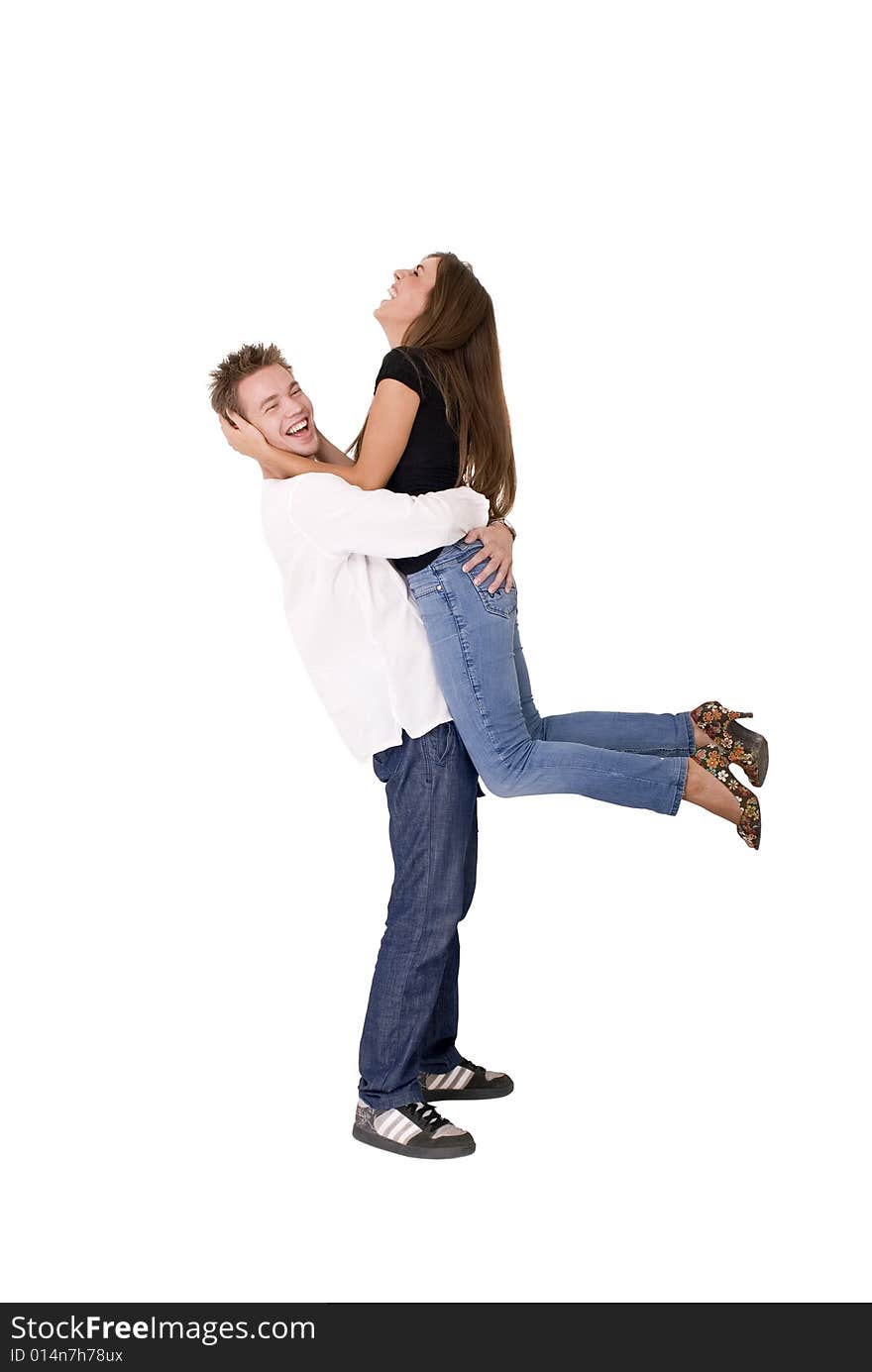 Boy is holding his girlfriend in the air. Boy is holding his girlfriend in the air