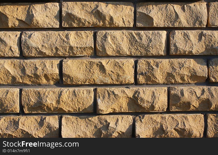 Broun old brick textured wall. Cracked bricks. Broun old brick textured wall. Cracked bricks.