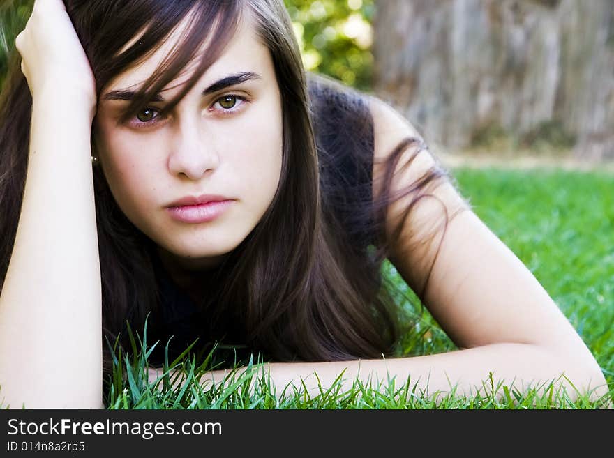 Young woman on grass