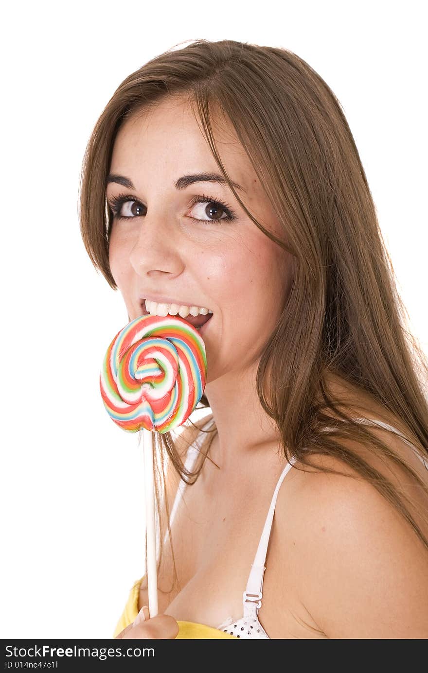 Girl licking her lollipop isolated on white. Girl licking her lollipop isolated on white