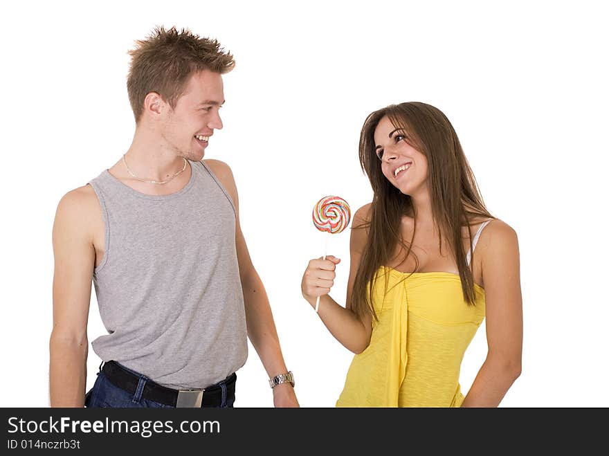 Guy giving his girlfriend a lollipop. Guy giving his girlfriend a lollipop