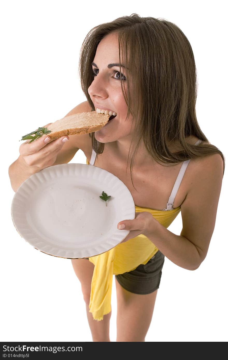 Cute girl eating a slice of bread. Cute girl eating a slice of bread