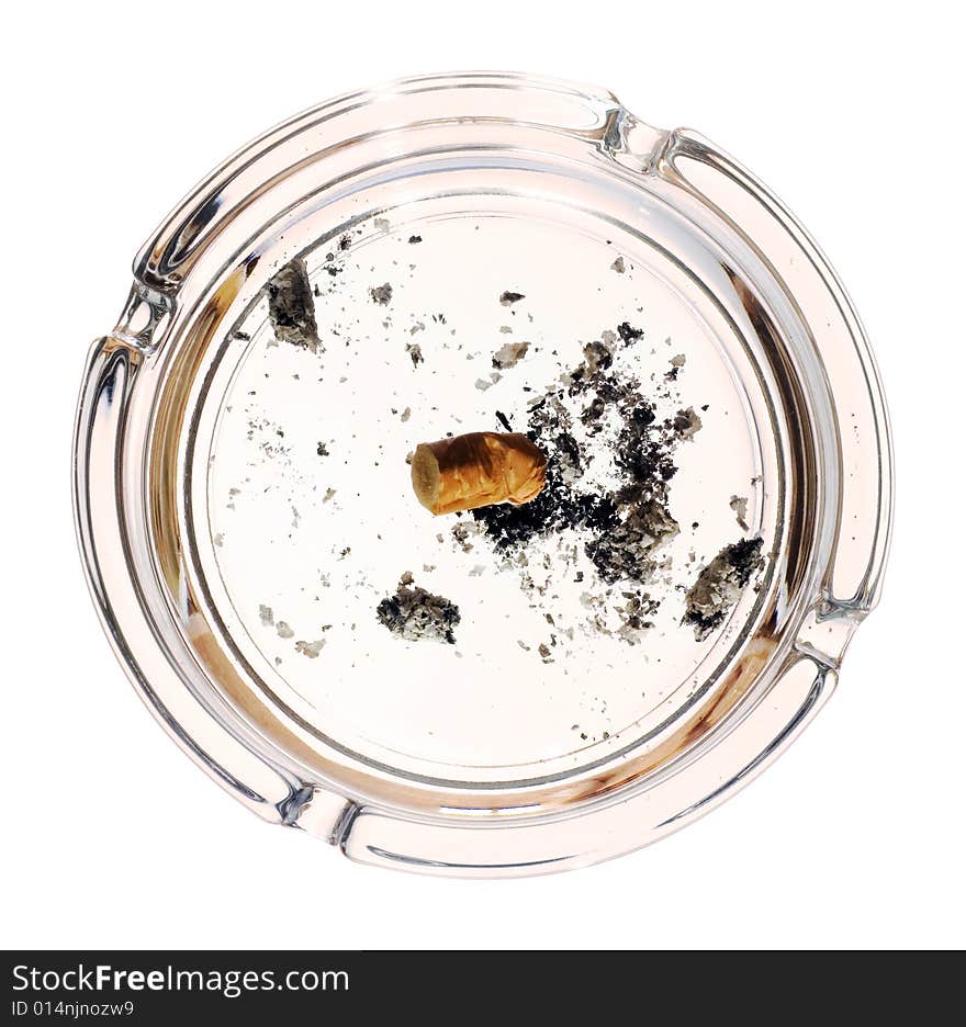 Cigarette in ashtray on white background.