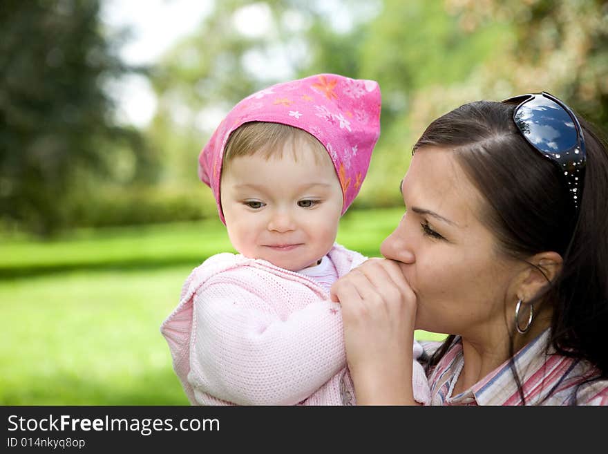 Happy family on green meadow. Happy family on green meadow