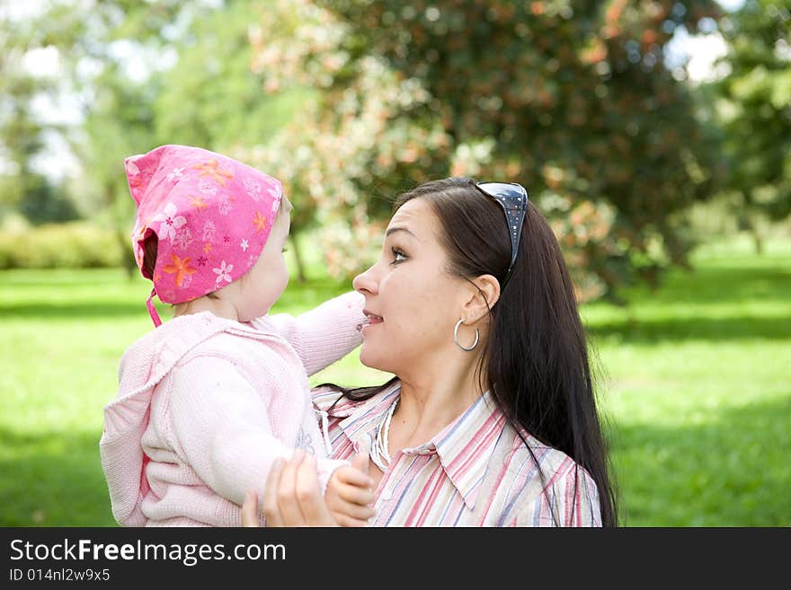 Happy family on green meadow. Happy family on green meadow