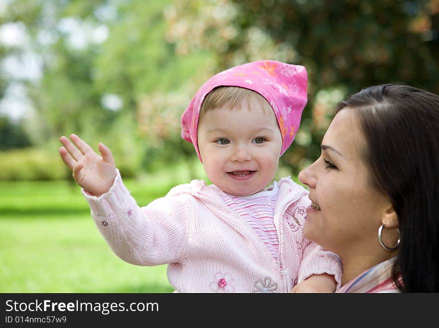 Happy family on green meadow. Happy family on green meadow